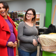 Meghan, Duchess of Sussex presents Angela Midgley with a Moses basket at ‘Number Seven’, a ‘Feeding Birkenhead’ citizen’s supermarket and community cafe, on January 14, 2019 in Birkenhead, Merseyside, England.